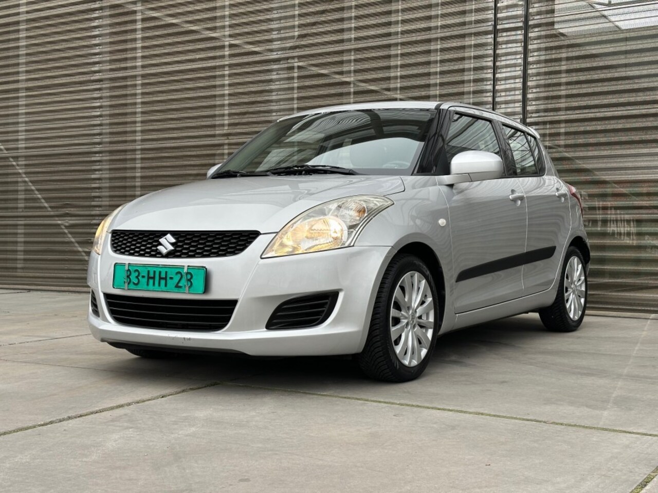 Suzuki Swift - 1.2 BANDIT EASSS AIRCO/LM VELGEN !! - AutoWereld.nl