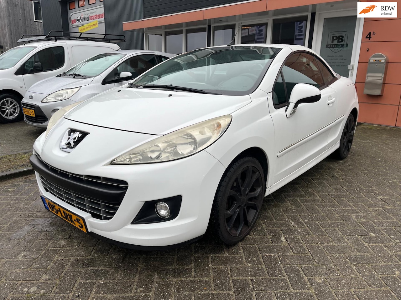 Peugeot 207 CC - 1.6 VTi Noir & Blanc airco nette auto - AutoWereld.nl