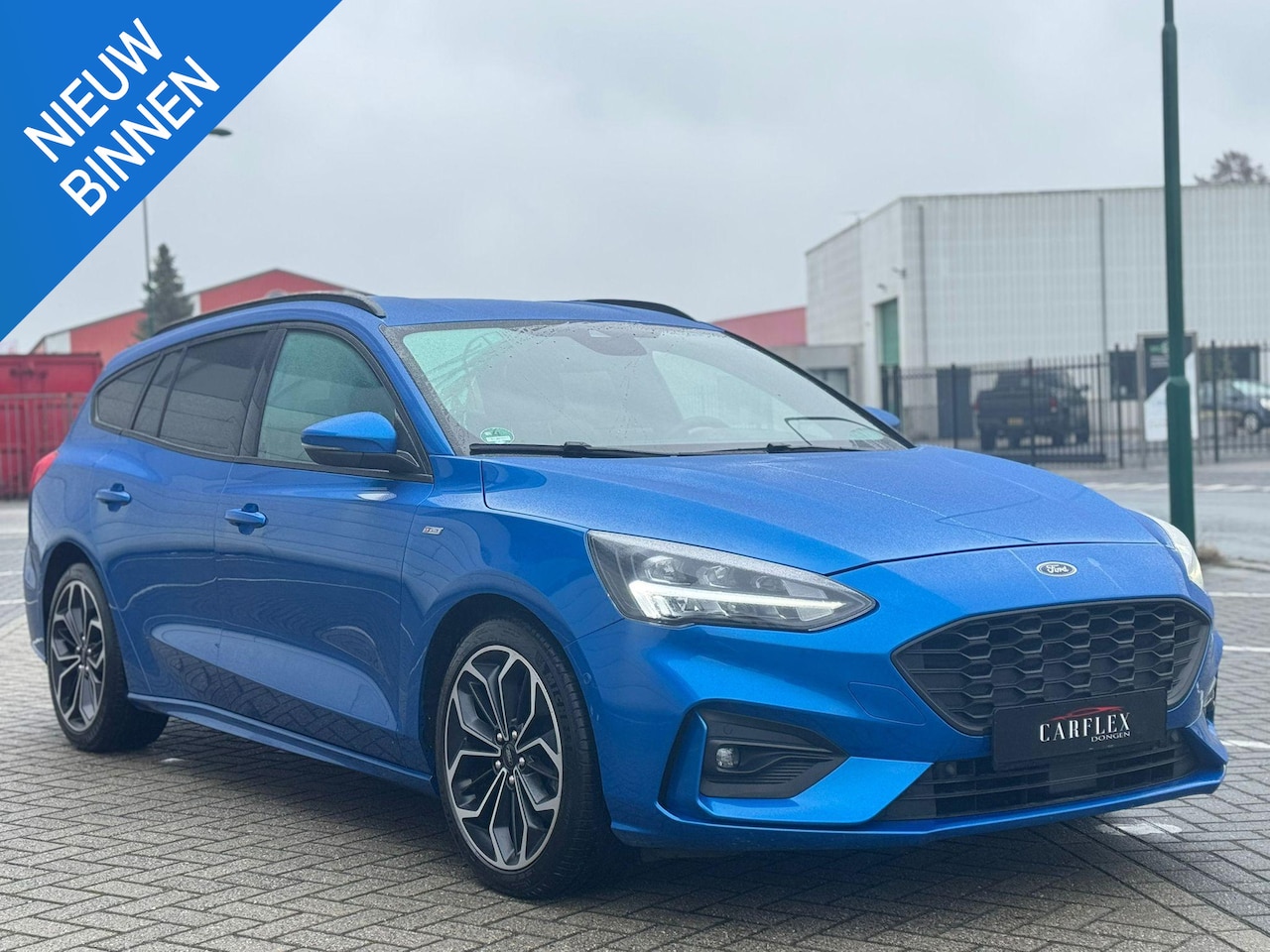 Ford Focus Wagon - 1.5 EcoBoost ST Line Automaat/Camera/NAVI/18" - AutoWereld.nl