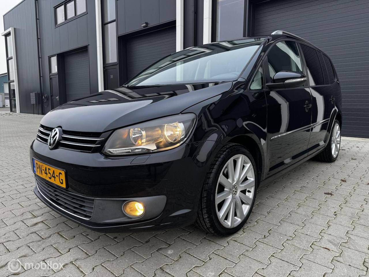 Volkswagen Touran - 1.4 TSI Highline 7p. 1.4 TSI Highline 7Pers. 2011 - AutoWereld.nl