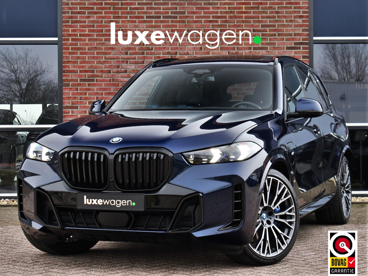BMW X5 - xDrive50e M-Sport Pro Pano Trekh ACC Comfstoel HUD 360 22inch - AutoWereld.nl