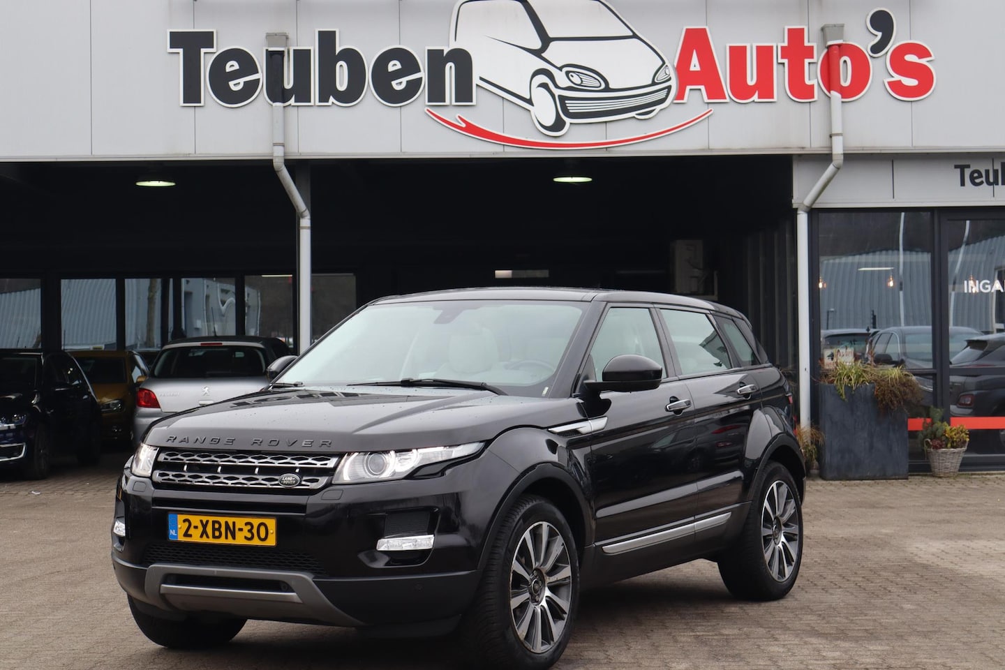 Land Rover Range Rover Evoque - 2.0 Si 4WD Prestige Navigatie, Camera, Climate control, Stoelverwarming, Panoramadak, Trek - AutoWereld.nl