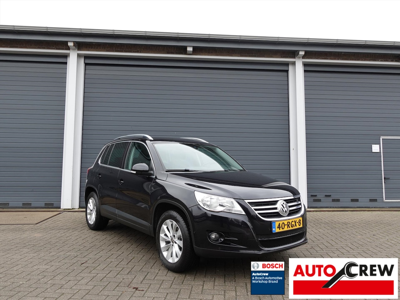 Volkswagen Tiguan - 1.4 TSI 150pk Sport & Style NAP 1E EIGENAAR LEDER CRUISE PDC NAVI - AutoWereld.nl