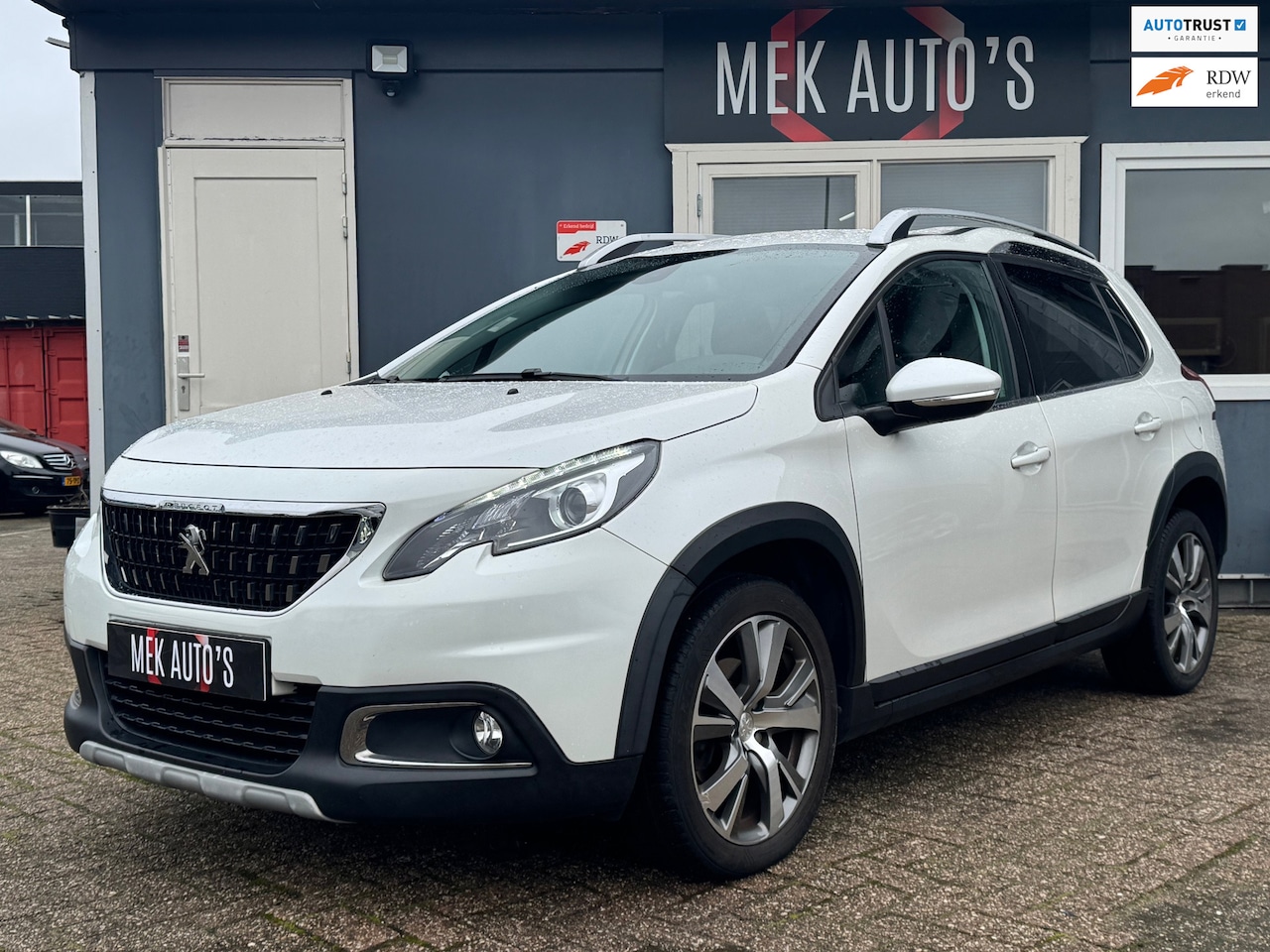 Peugeot 2008 - 1.2 PureTech GT-Line|Camera|Navi||Leder|Cruise|Climate|Trekhaak| - AutoWereld.nl