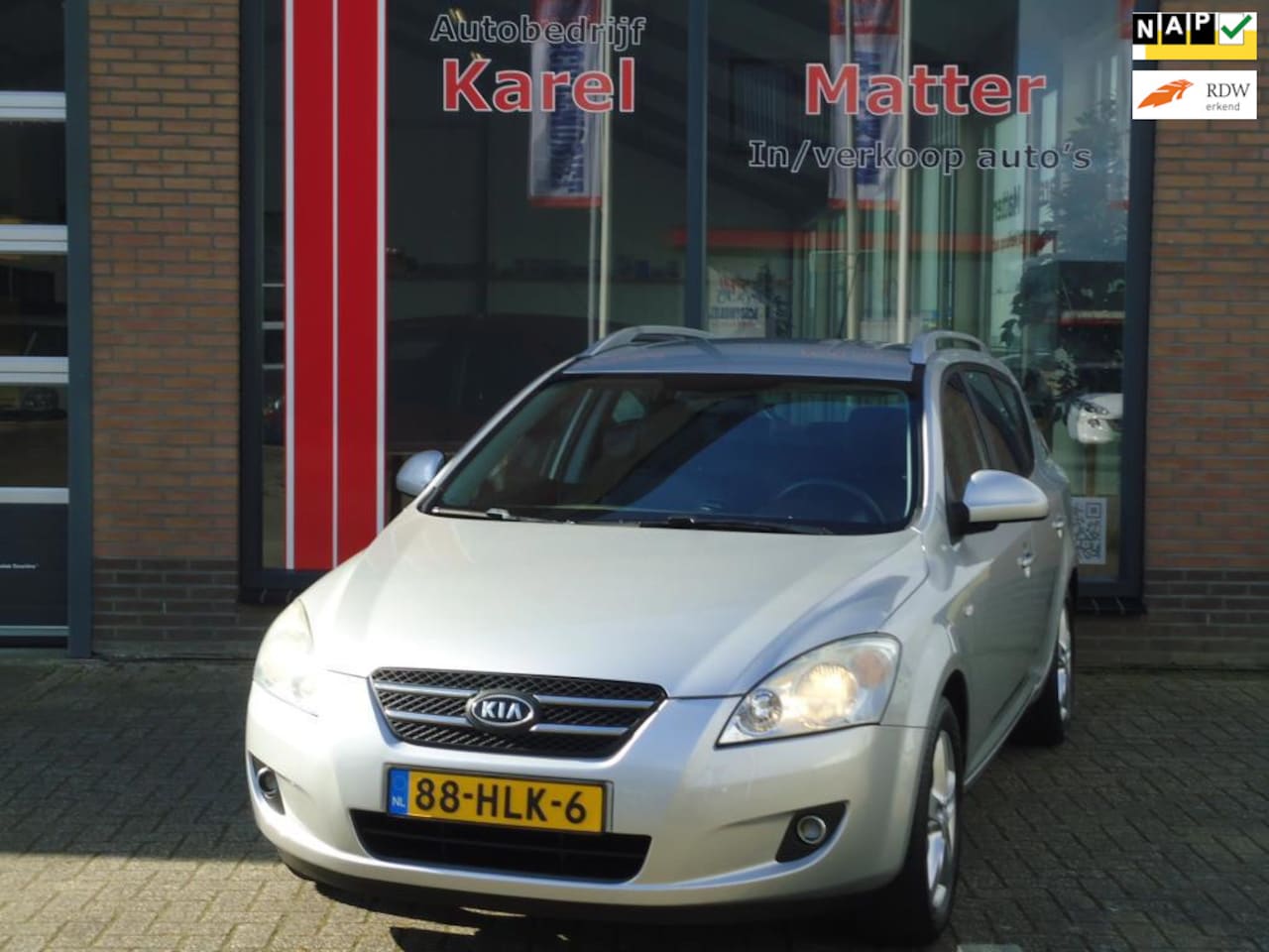 Kia Cee'd Sporty Wagon - 1.6 Business Edition *TREKHAAK* *NAVIGATIE* *PARKEERSENSOREN* - AutoWereld.nl