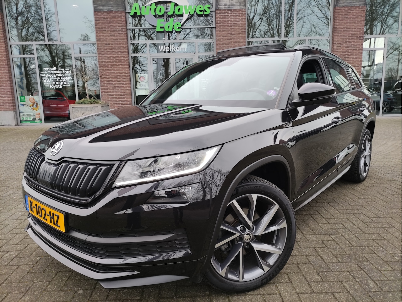 Skoda Kodiaq - 1.5 TSI DSG Sportline Business Panoramadak - Wegklapbare trekhaak - Premium audio - 20Inch - AutoWereld.nl