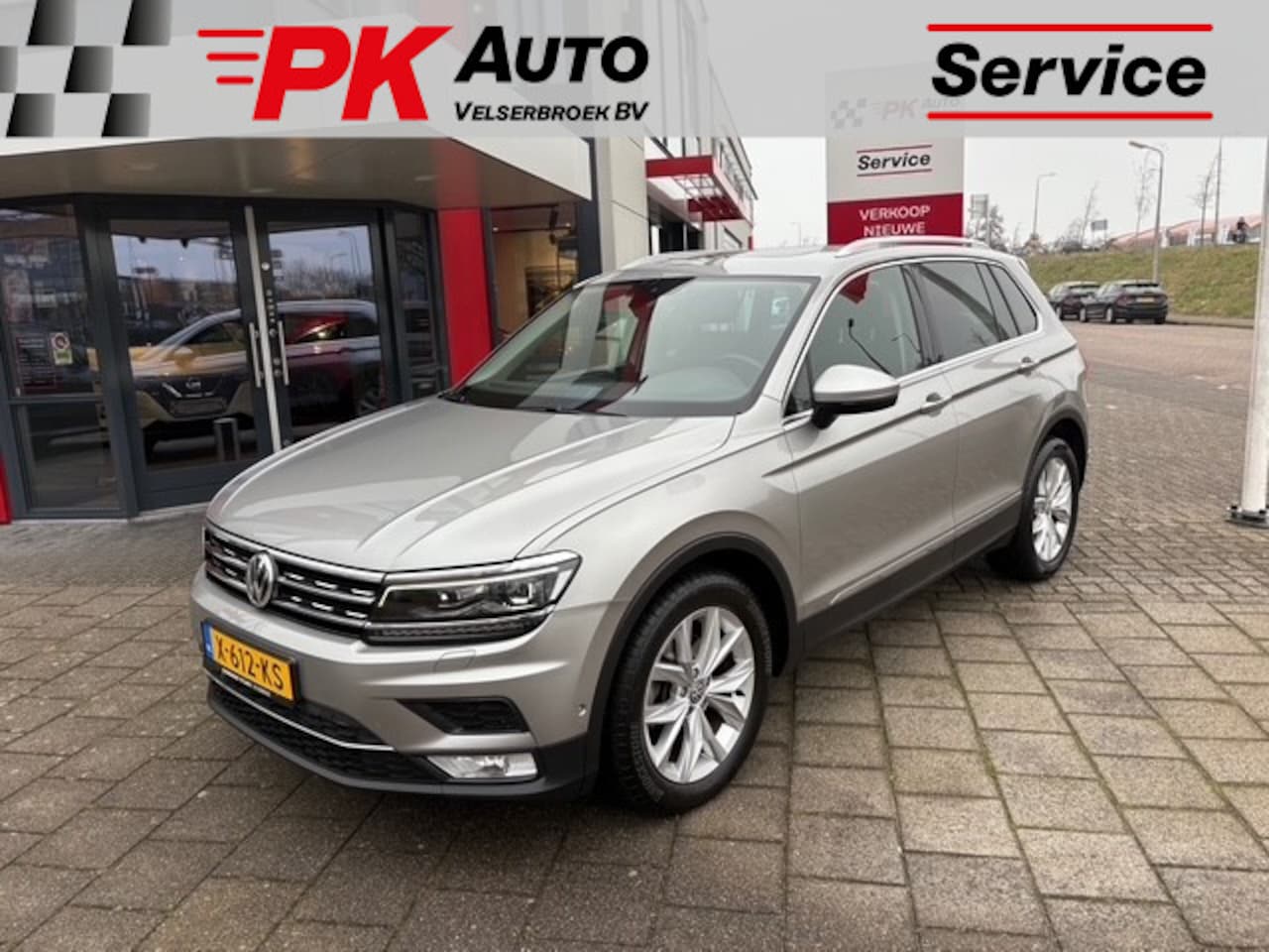 Volkswagen Tiguan - 1.4 TSI ACT Comfortline Business R | Navi | Pano | Trekhaak | 103.333 km Dealeronderhouden - AutoWereld.nl