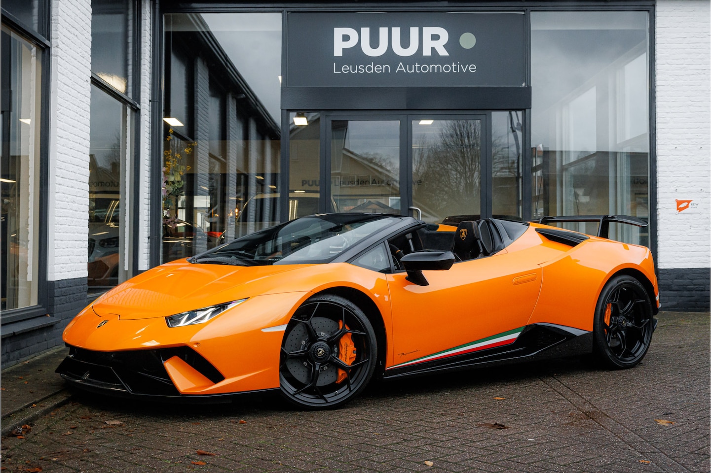 Lamborghini Huracán - 5.2 V10 Performante Spyder Arancio Borealis - Centerlock - Sensonum Audio - AutoWereld.nl