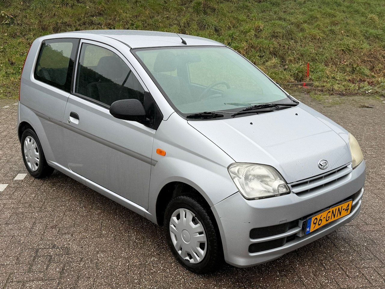 Daihatsu Cuore - 1.0-12V 100th Anniversary! KMST NAP! STUURBEKRACHTEGING l AUDIO AUX! LEUKE AUTO! - AutoWereld.nl