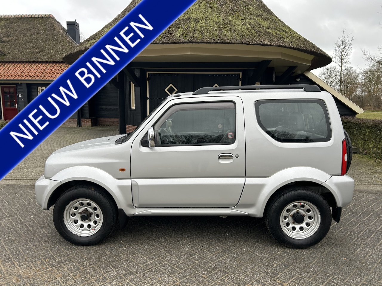 Suzuki Jimny - 1.3 JX 4WD Cv Trekhaak Elec Pakket Nap - AutoWereld.nl