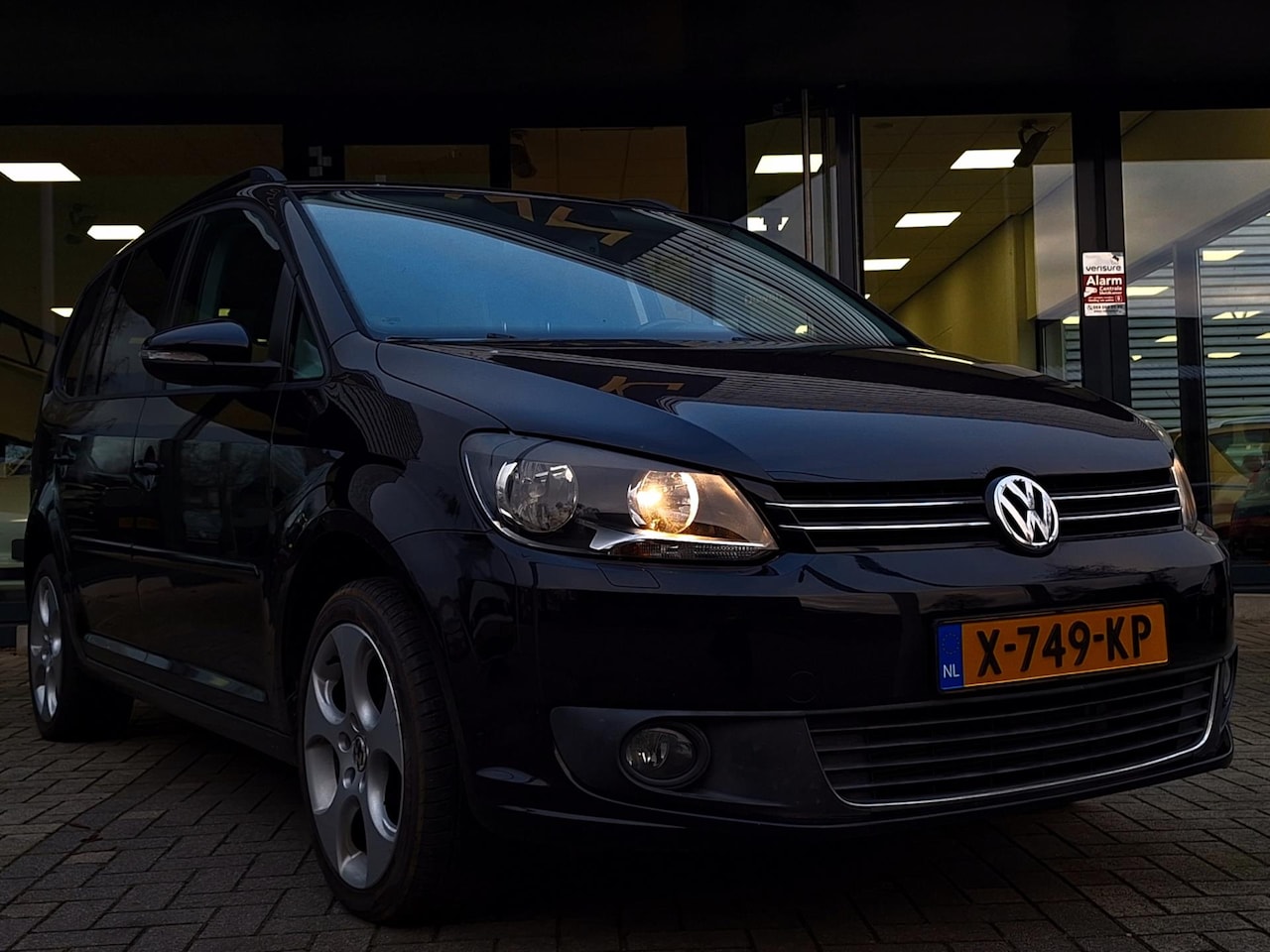 Volkswagen Touran - 1.2 TSI Easyline 7p. Navi Stoelverw. - AutoWereld.nl