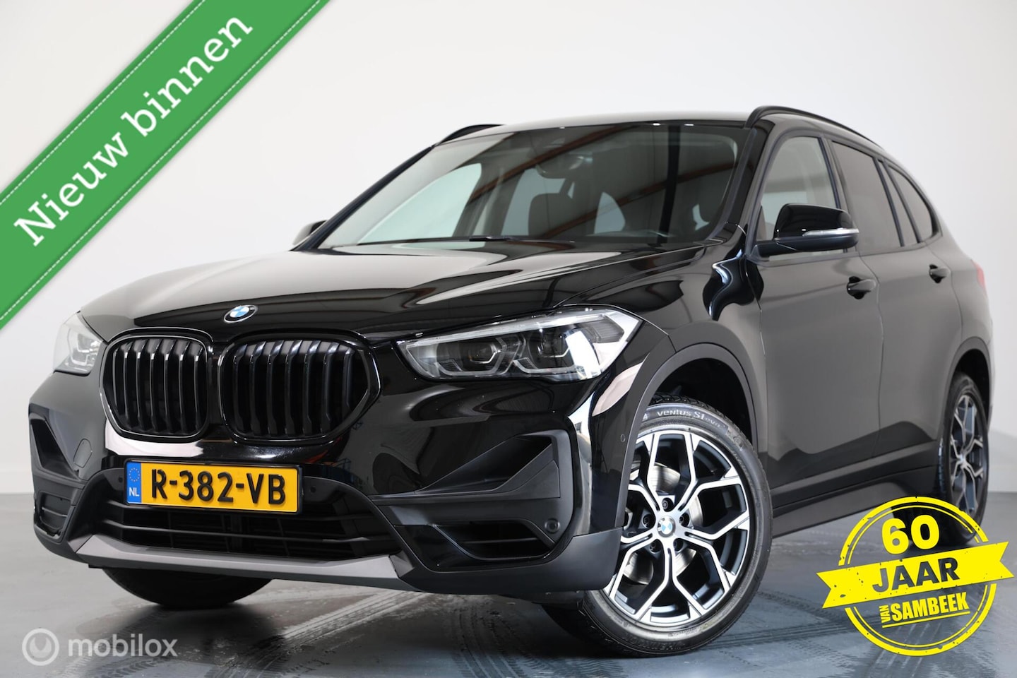 BMW X1 - sDrive18i - STOELVERWARMING - NAVI - AIRCO - LAGE KM - AutoWereld.nl