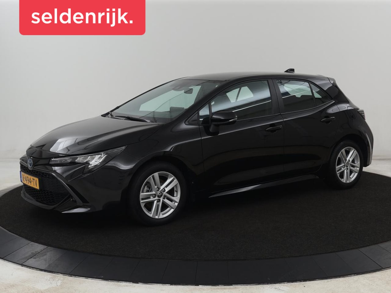 Toyota Corolla - 1.8 Hybrid Active | Carplay | Navigatie | Adaptive cruise | Climate control | DAB | Keyles - AutoWereld.nl