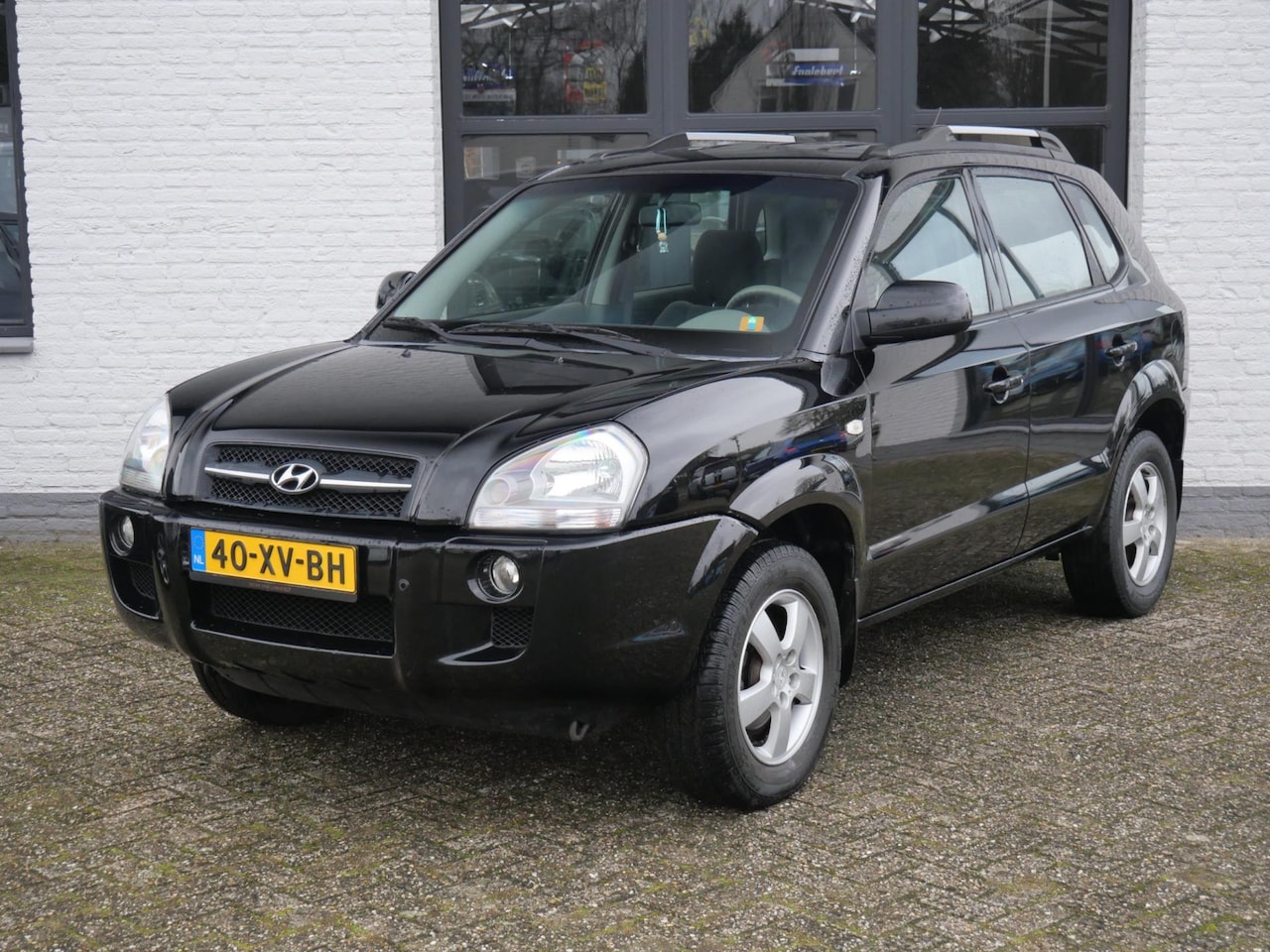 Hyundai Tucson - 2.0i Active 138.000km !!! Airco Elektrische ramen Trekhaak - AutoWereld.nl