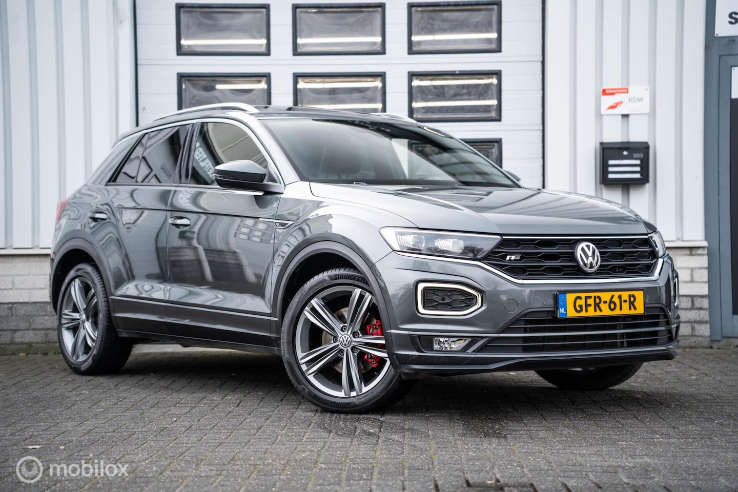 Volkswagen T-Roc - 2.0 TSI 4Motion 3X R-Line VIRTUAL PANO ACC - AutoWereld.nl