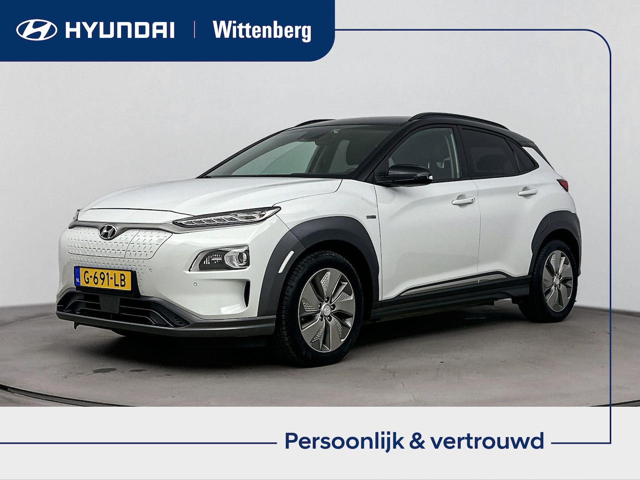 Hyundai Kona Electric - EV PREMIUM 64 kWh | TWO TONE | NAVI | CLIMA | CRUISE | CAMERA | HUD | LEDER | STUUR- & STO - AutoWereld.nl