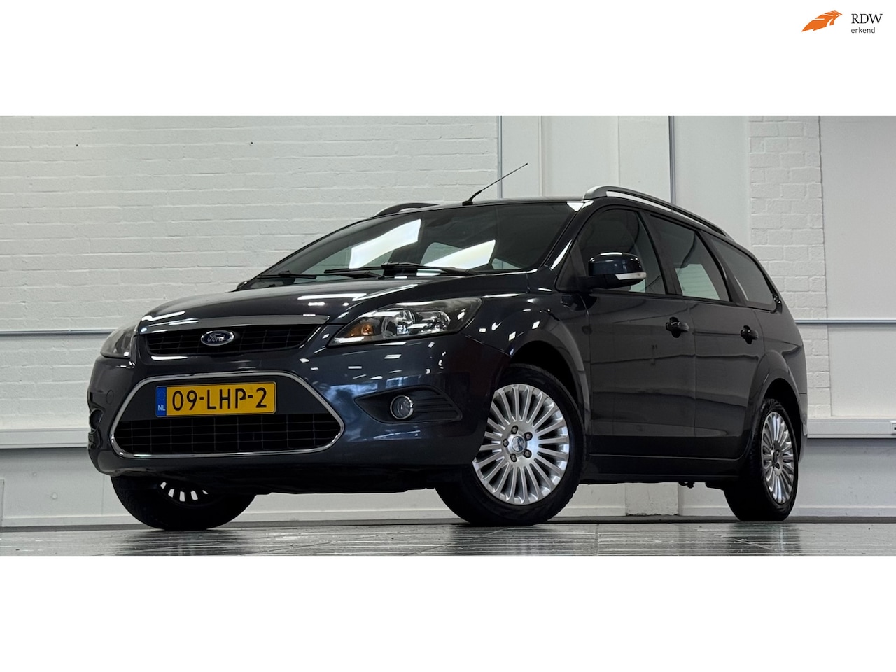 Ford Focus Wagon - 1.8i 16V Limited Flexi Fuel Trekhaak 3e Eigenaar Mooi! - AutoWereld.nl