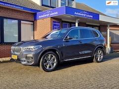 BMW X5 - XDrive45e High Executive H&K Panorama Laser El. Trekhaak Head Up Comfortstoelen ACC Warmte
