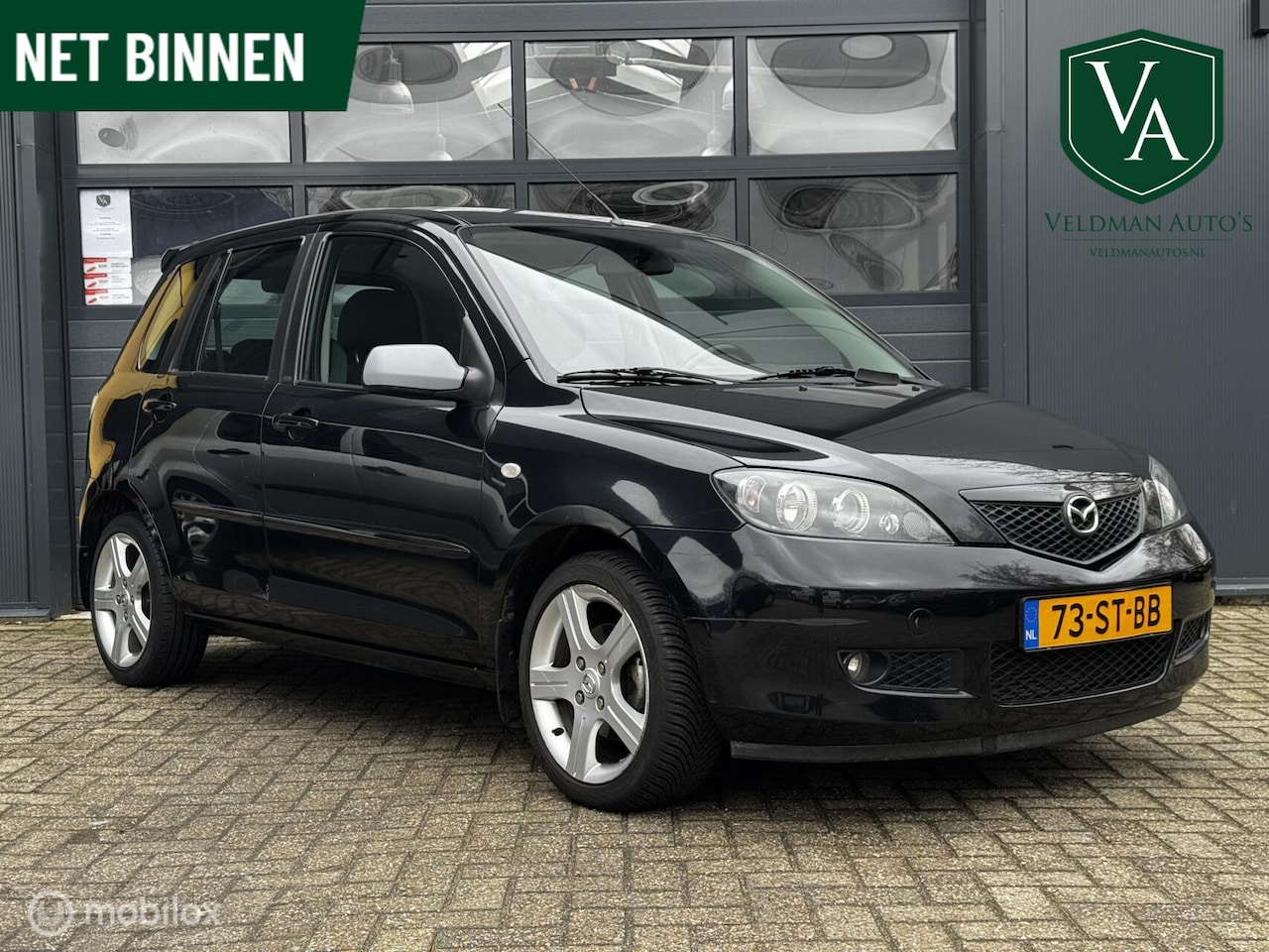 Mazda 2 - 1.4 Exclusive | Airco | Trekhaak - AutoWereld.nl