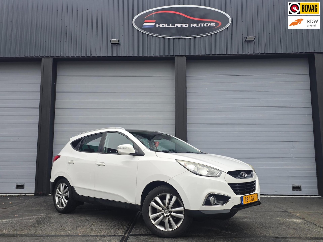 Hyundai ix35 - 2.0i i-Catcher 2.0i i-Catcher, leder, trekhaak, camera, navi, goed rijdend - AutoWereld.nl