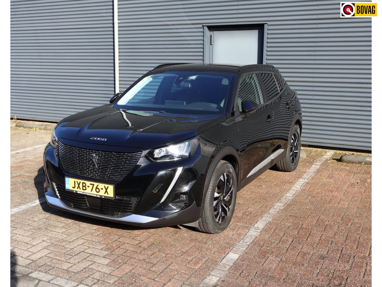 Peugeot 2008 - 1.2 PureTech Allure Pack Navi Apple Carplay Camera Dealer Cruise Airco Garantie - AutoWereld.nl