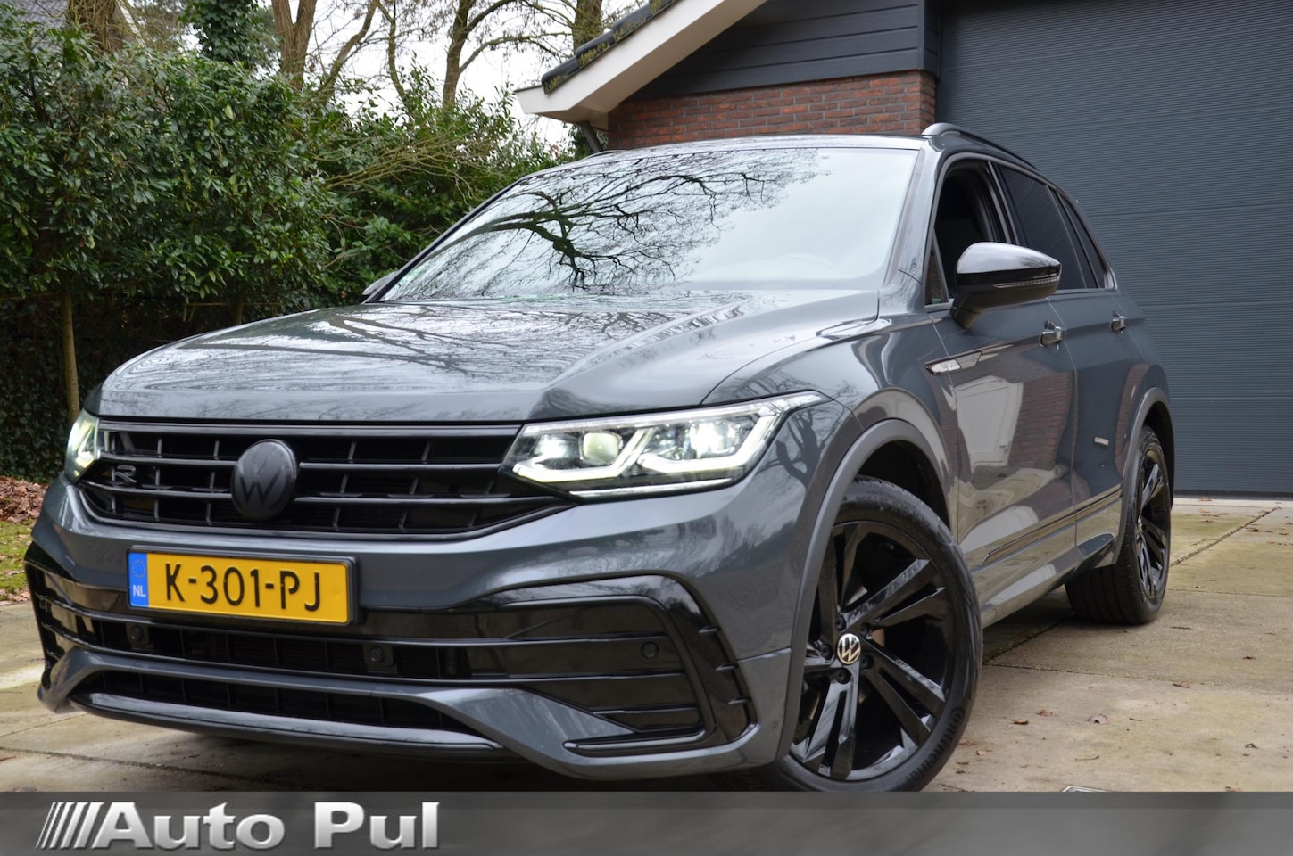 Volkswagen Tiguan - 1.5 TSI R-Line Business+ Automaat/Navi/Pdc/Ecc/Achteruitrijcamera/Panoramadak/Virtueel das - AutoWereld.nl