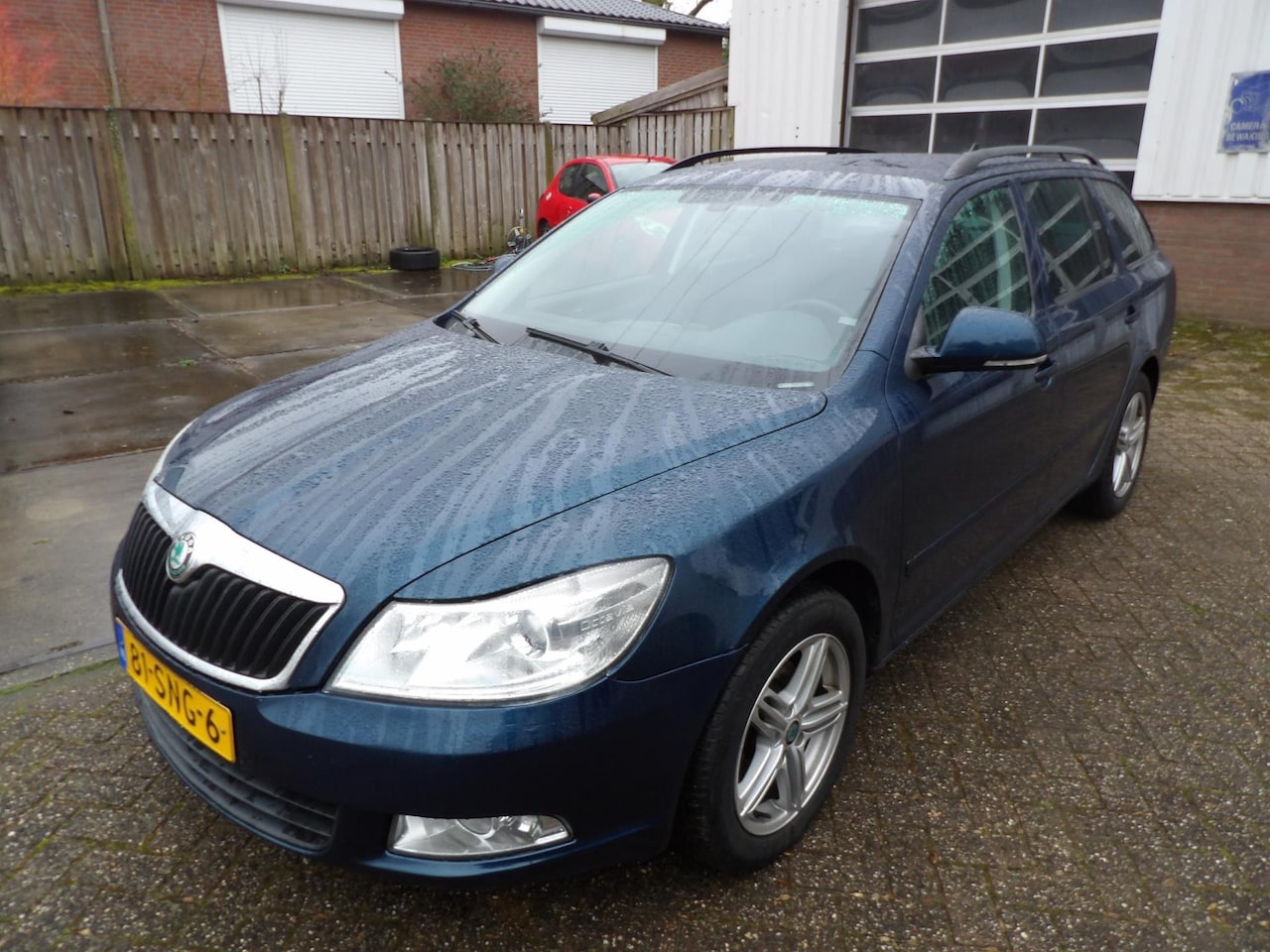 Skoda Octavia Combi - 1.2 TSI Ambition Business Line airco navi auto maat - AutoWereld.nl