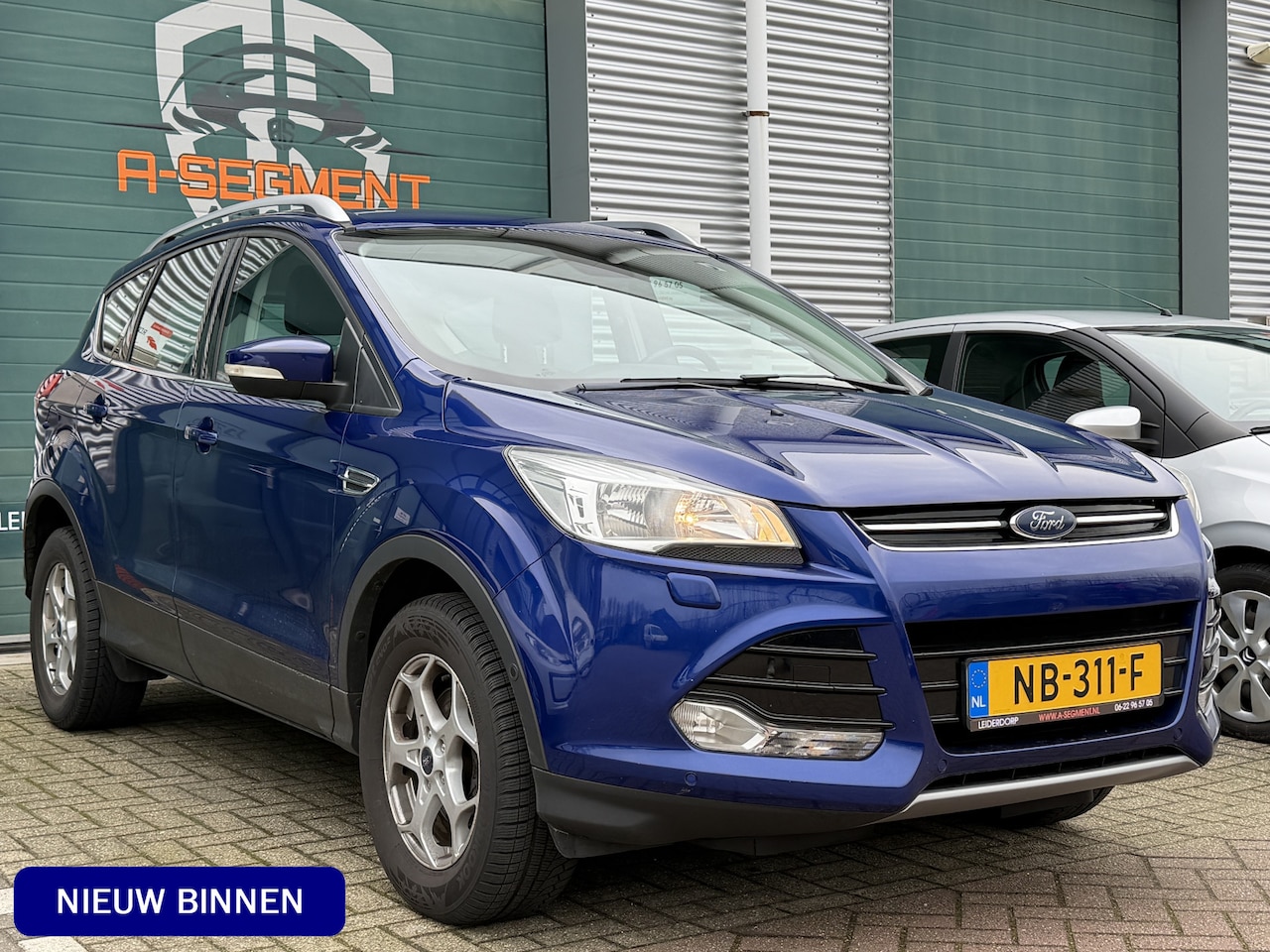 Ford Kuga - 1.5 Titanium / Trekhaak / Camera / Cruise / NAP / Winterpakket - AutoWereld.nl