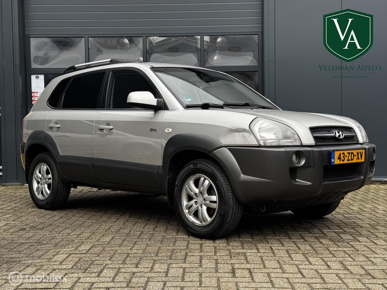 Hyundai Tucson - 2.0i 4WD Style | 4x4 | trekhaak | Airco - AutoWereld.nl