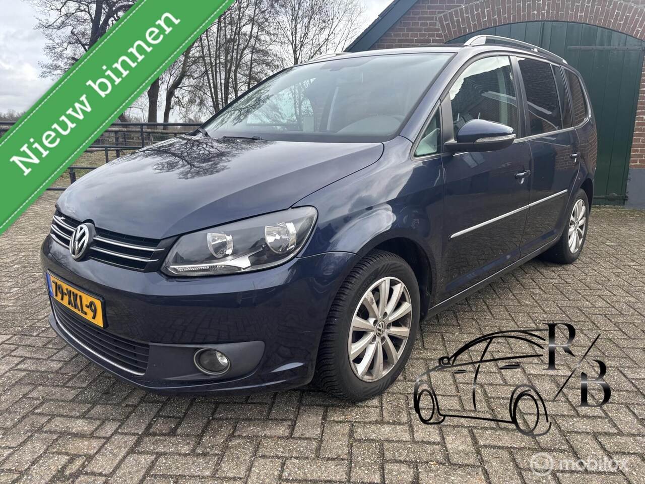 Volkswagen Touran - 1.2 TSI Highline BlueMotion 7p. 1.2 TSI Highline BlueMotion 7p. - AutoWereld.nl