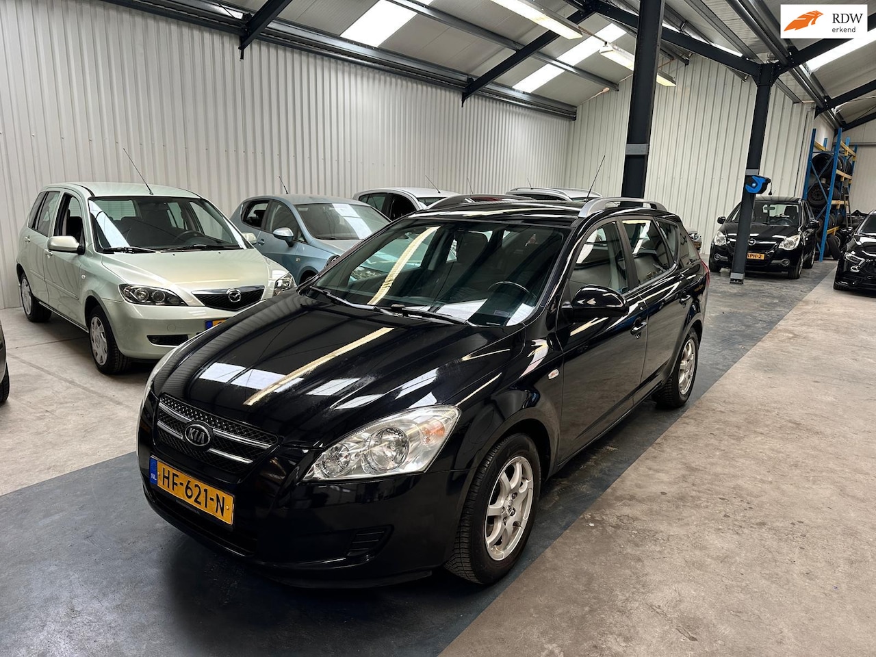 Kia Cee'd Sporty Wagon - 1.4 Fifteen ISG 1.4 Fifteen ISG - AutoWereld.nl