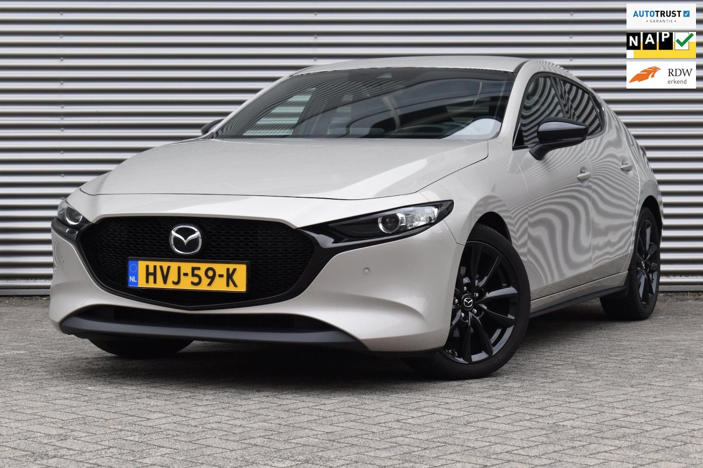 Mazda 3 - 2.0 e-SkyActiv-G M Hybrid HOMURA, Ecc, Camera, Xenon. - AutoWereld.nl