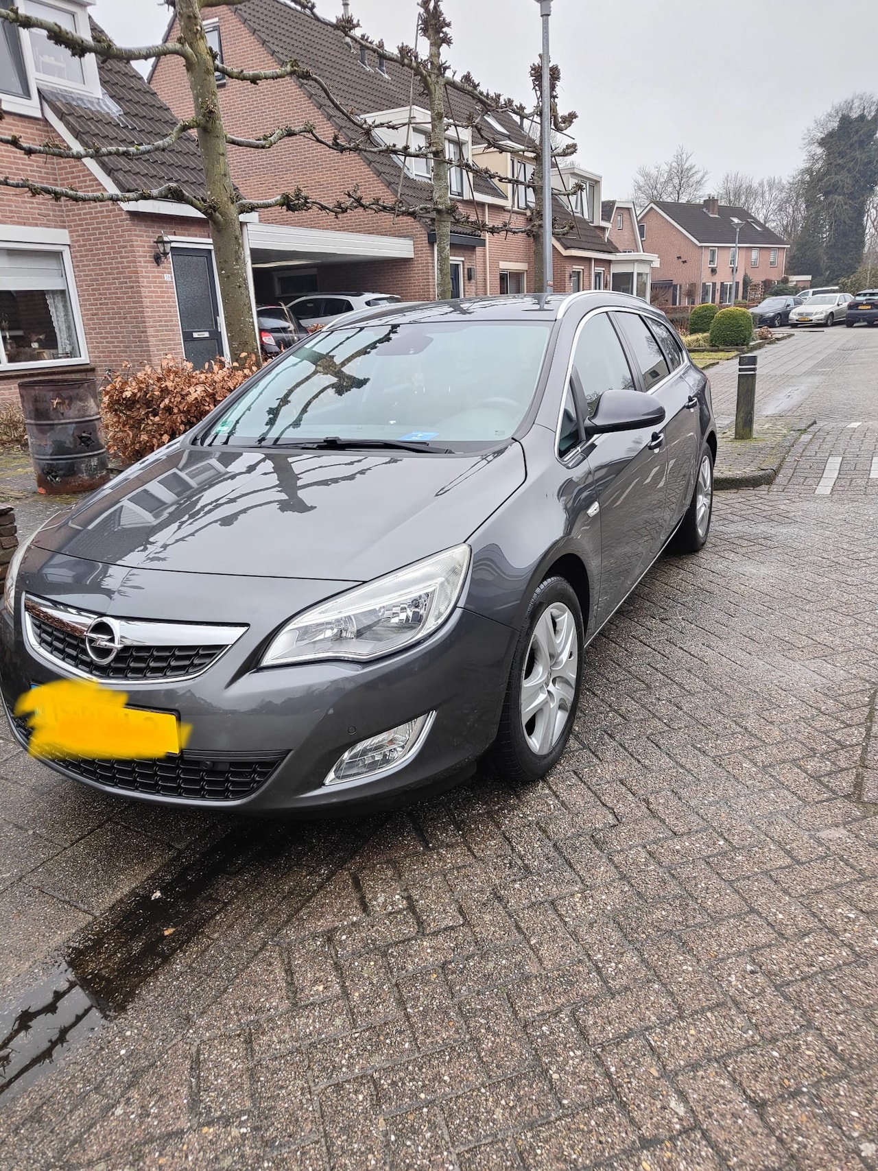 Opel Astra Sports Tourer - 1.4 Turbo Cosmo - AutoWereld.nl