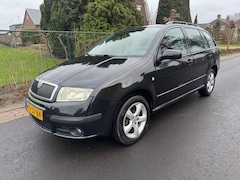 Skoda Fabia Combi - 1.4-16V AIRCO / NAVI / CRUISE / LM VELGEN