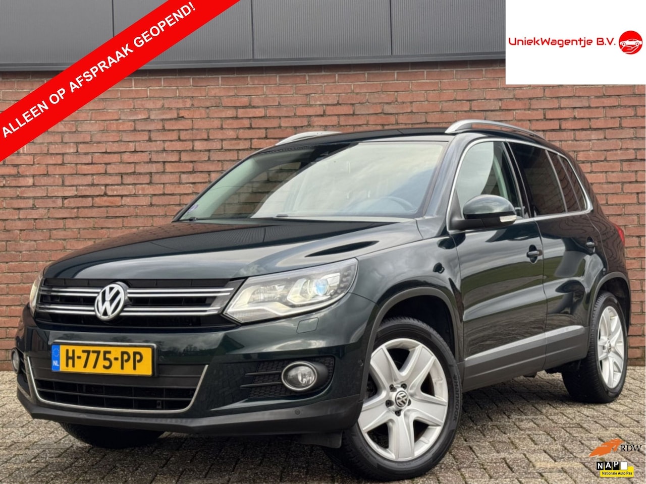 Volkswagen Tiguan - 1.4 TSI SPORT&STYLE | NAVI! | TREKHAAK! - AutoWereld.nl