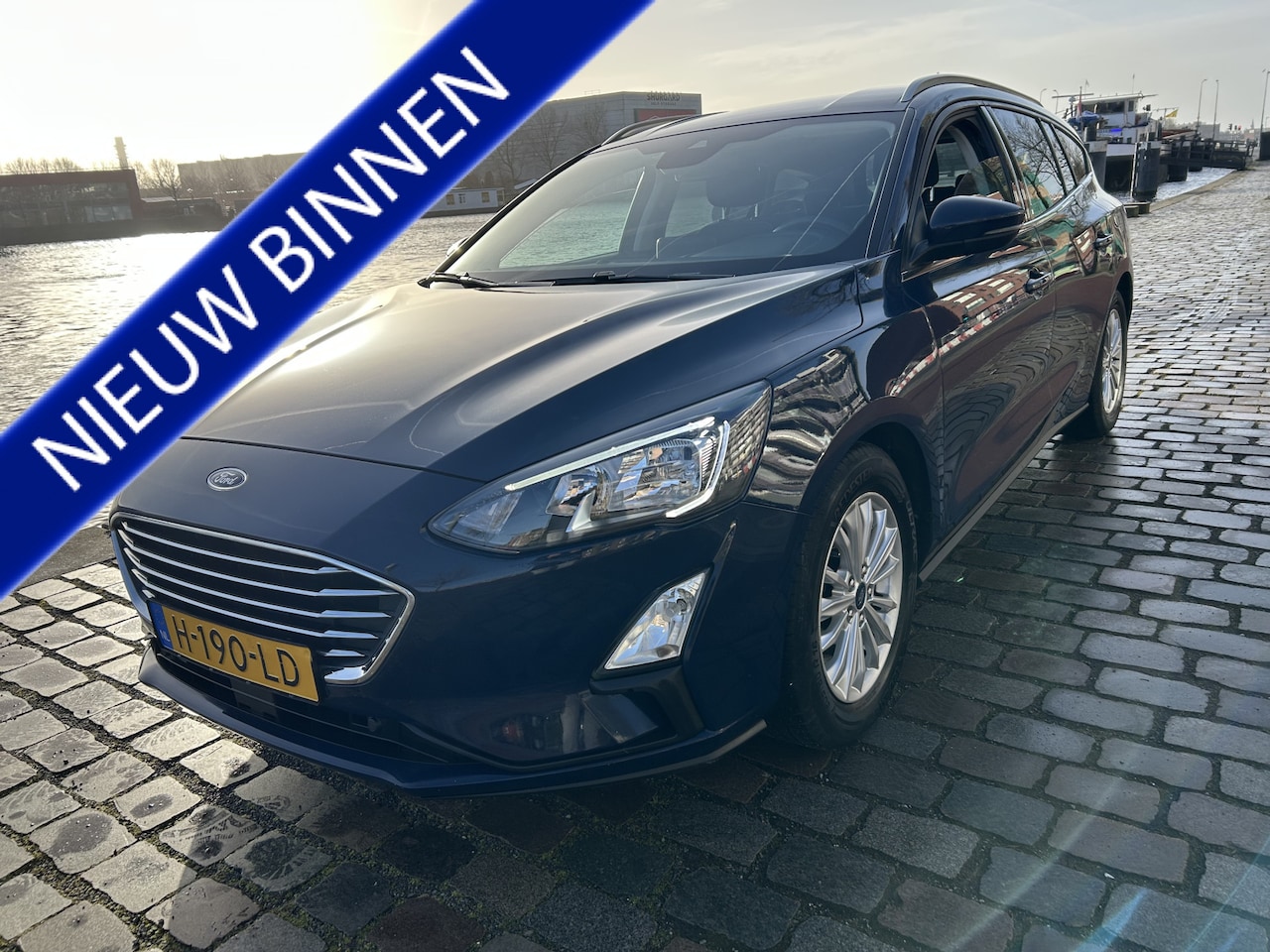 Ford Focus Wagon - 1.5 EcoBoost Titanium Business navi/camera airco/ecc - AutoWereld.nl