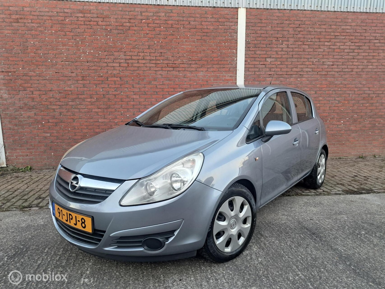 Opel Corsa - 1.2-16V Enjoy 1.2-16V Enjoy - AutoWereld.nl
