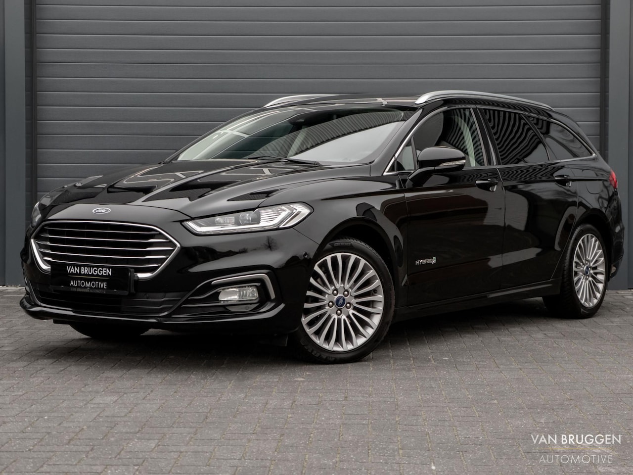 Ford Mondeo Wagon - 2.0 IVCT HEV Titanium Pano Trekhaak Camera ACC CarPlay - AutoWereld.nl