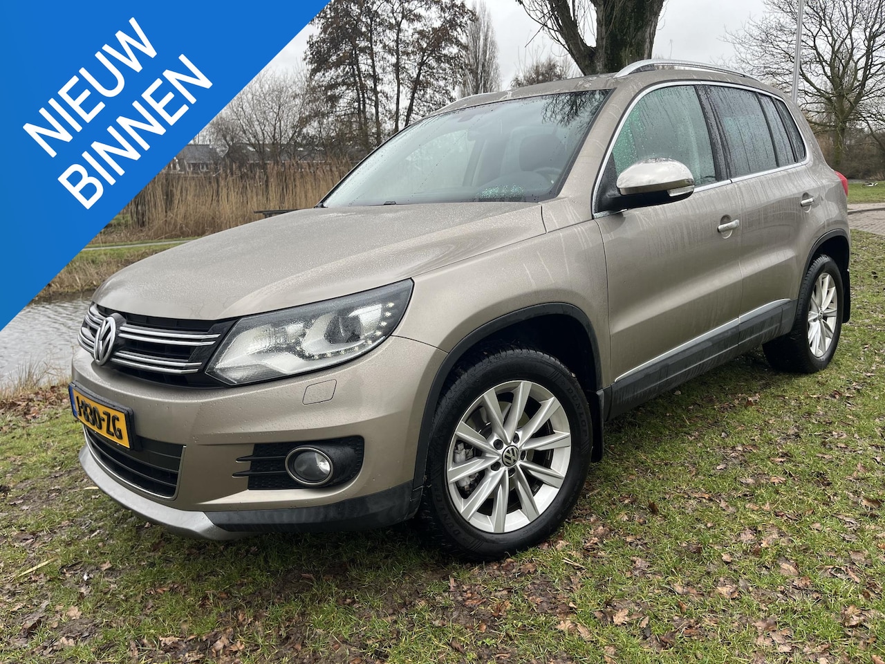 Volkswagen Tiguan - 2.0 TSI Sport&Style 4Motion Unieke staat - AutoWereld.nl