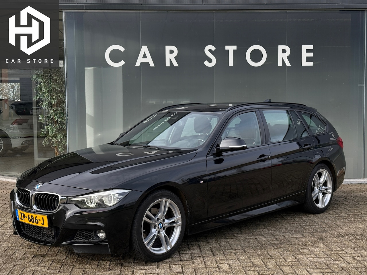 BMW 3-serie Touring - 318i M Sport Leder|Flippers|Dodehoek|Camera - AutoWereld.nl