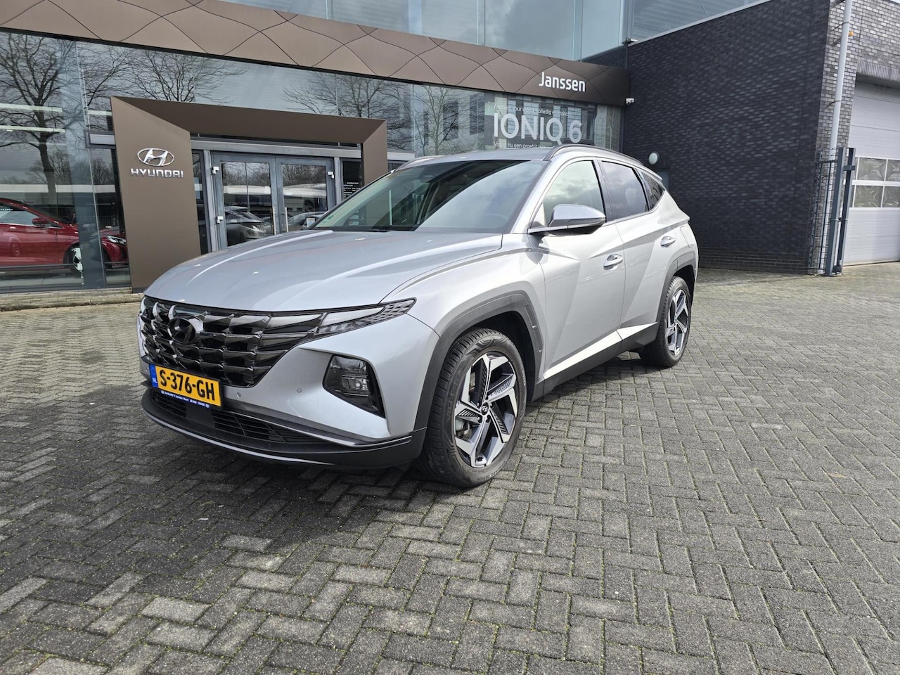 Hyundai Tucson - 1.6 T-GDI HEV Comfort Smart + trekhaak - AutoWereld.nl