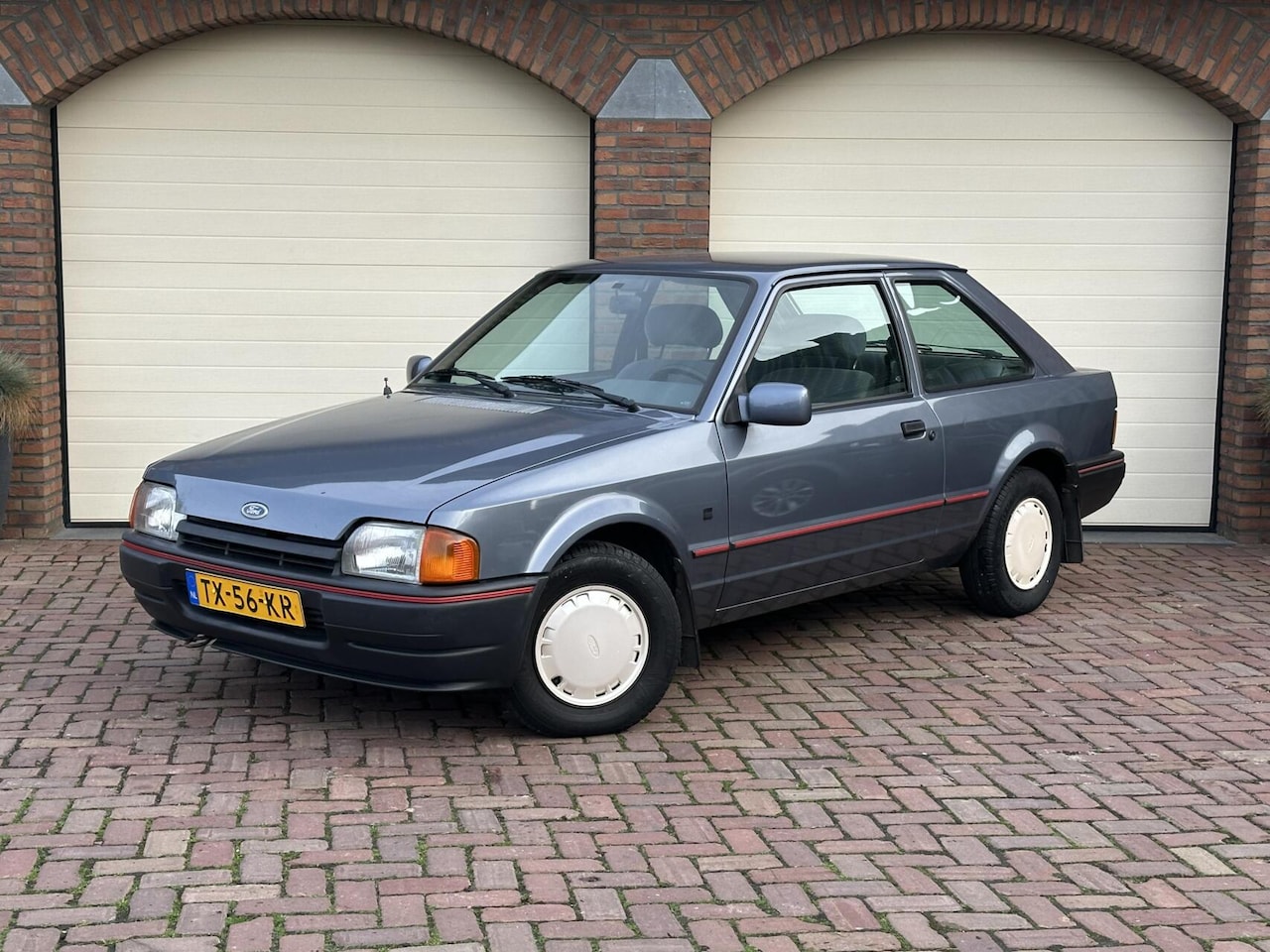 Ford Escort - 1.3 Bravo 3 drs. geheel origineel NL auto 145.000KM! 1e eigenaar - AutoWereld.nl
