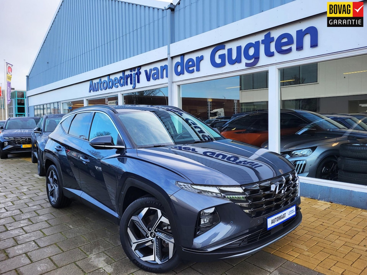 Hyundai Tucson - 1.6 T-GDI HEV Comfort Smart / Camera / Stoelverwarming / Carplay & Android / - AutoWereld.nl