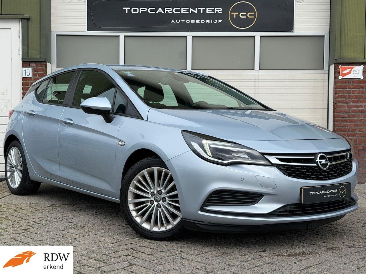 Opel Astra - 1.0 Innovation/AUT/AIRCO/PARKS/NAVI/CRUISE/APK - AutoWereld.nl
