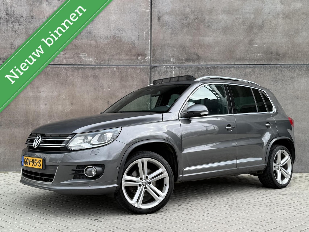 Volkswagen Tiguan - 1.4 TSI Sport&Style 4Motion Trekhaak | Pano | Leder | Xenon | Dynaudio | Full options! - AutoWereld.nl