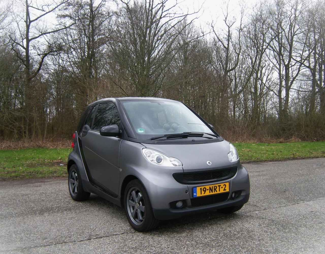 Smart Fortwo coupé - 1.0 mhd Passion . Pano dak . Airco . LMV . Lader intrieur . enz - AutoWereld.nl