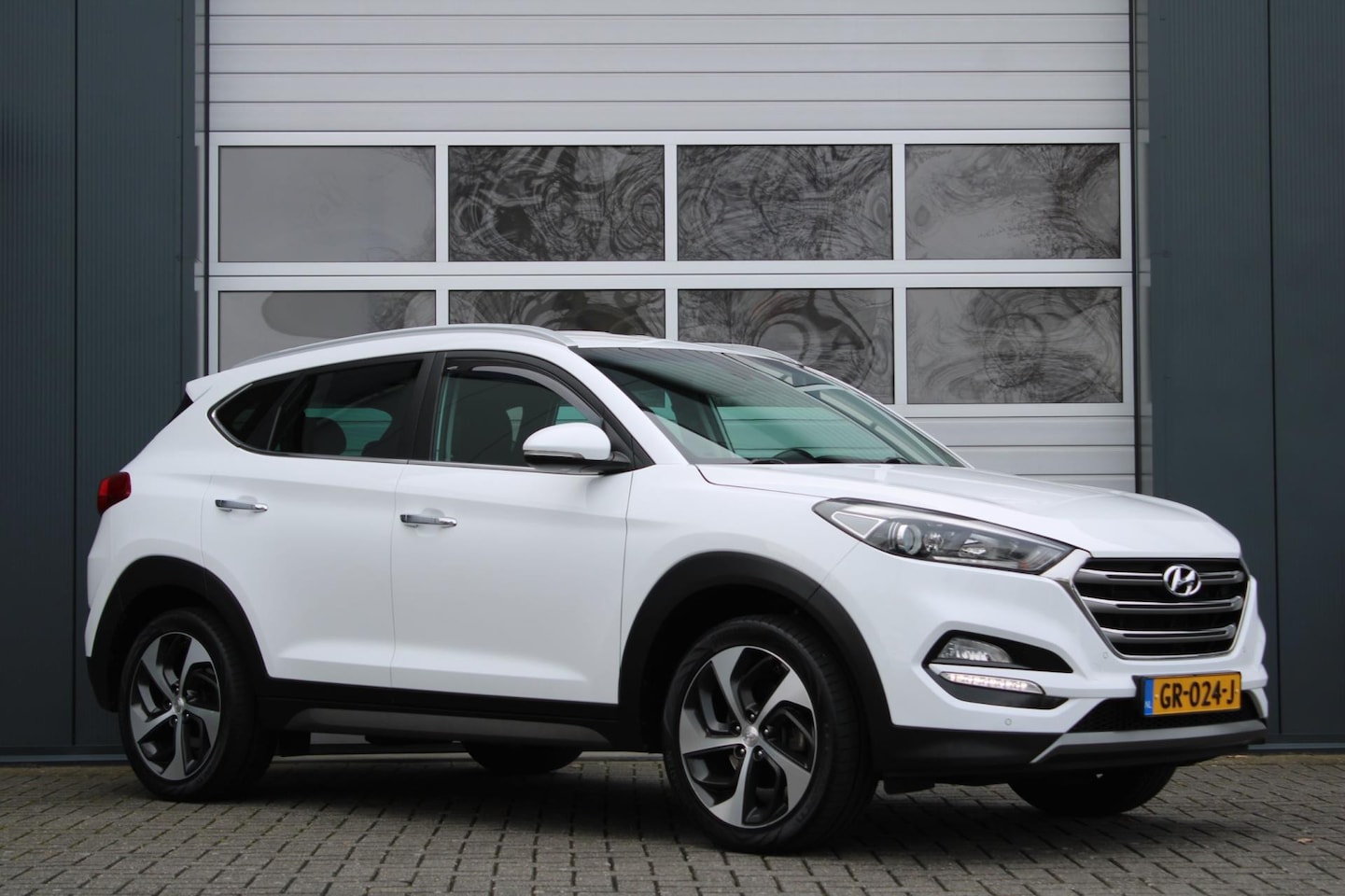 Hyundai Tucson - 1.6 GDi Comfort Clima/Cruise/Stoelverwarming/Camera/Navi/Bluetooth/PDC/Lane.Assist/LED/Rad - AutoWereld.nl
