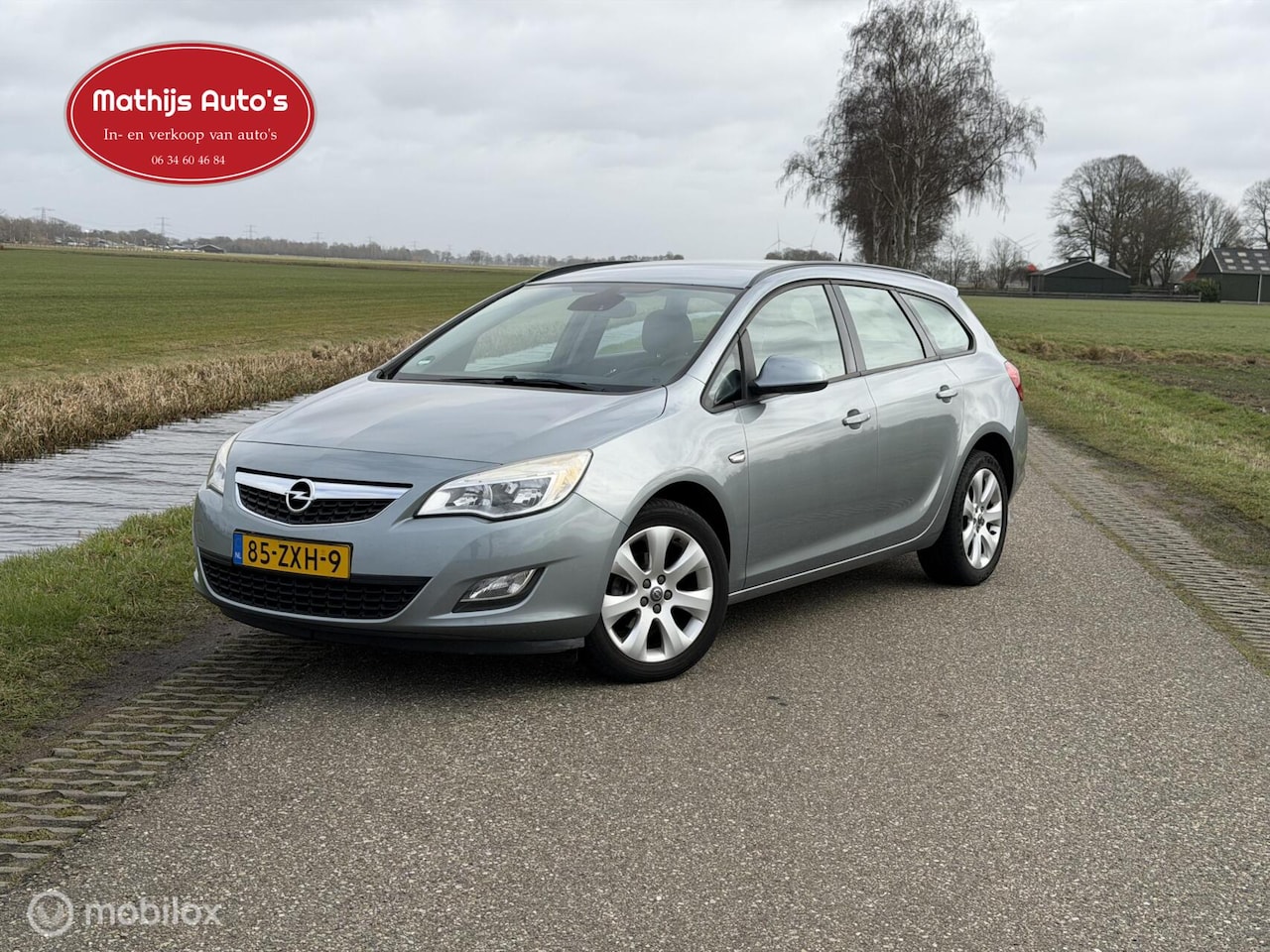 Opel Astra Sports Tourer - 1.4 Turbo Sport 1.4 Turbo Sport - AutoWereld.nl