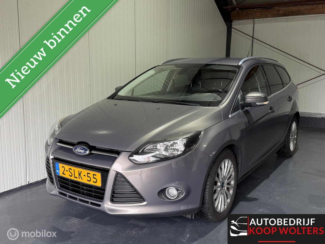 Ford Focus Wagon - 1.0 PDC Trekhaak Titanium 2013 - AutoWereld.nl