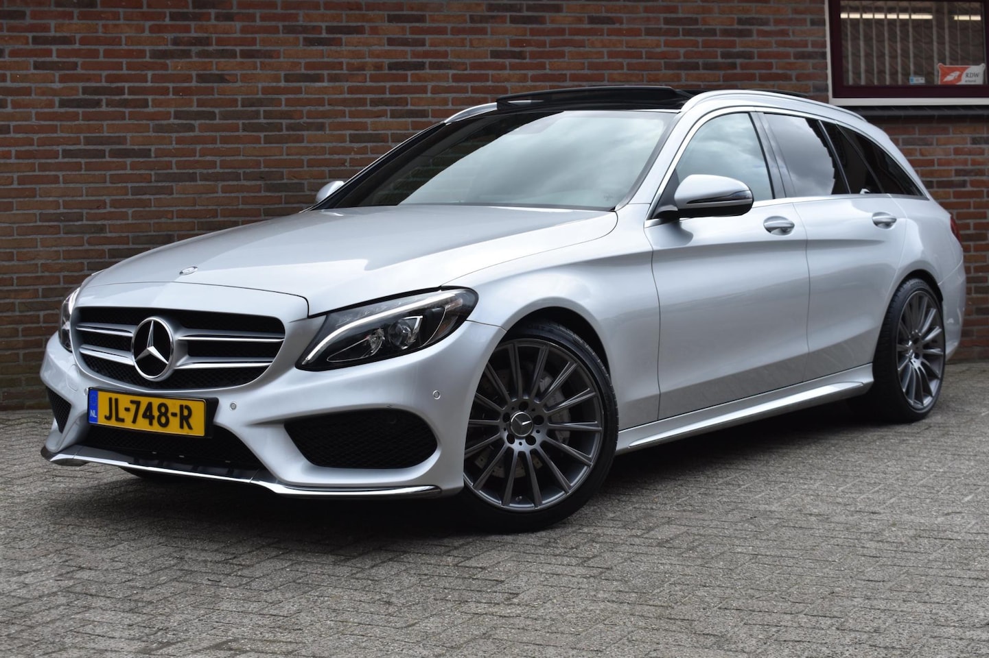 Mercedes-Benz C-klasse Estate - 250 Prestige '16 Pano AMG Pakket Leder Navi Clima Cruise Inruil mogelijk NAP NL Auto - AutoWereld.nl